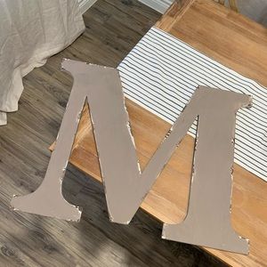 Rustic “M” wall sign